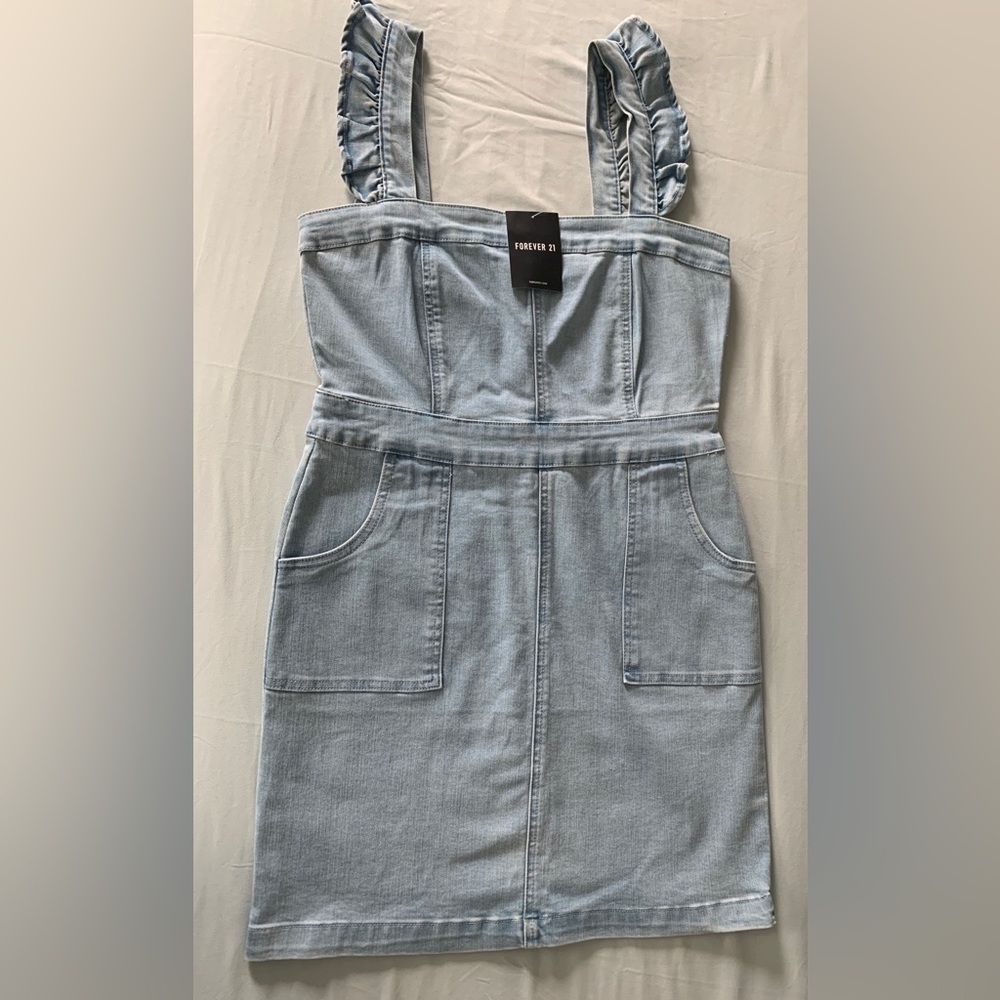 Forever 21 Light denim dress Size L.  This is more of a medium fit.